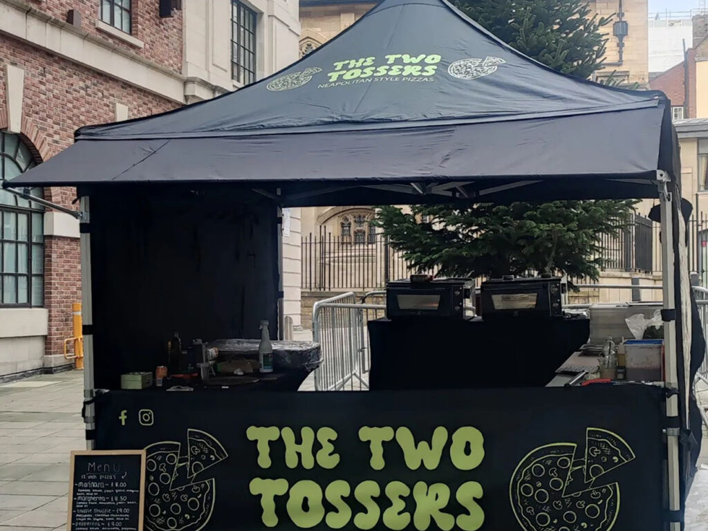 black pop up pizza gazebo with rain awning